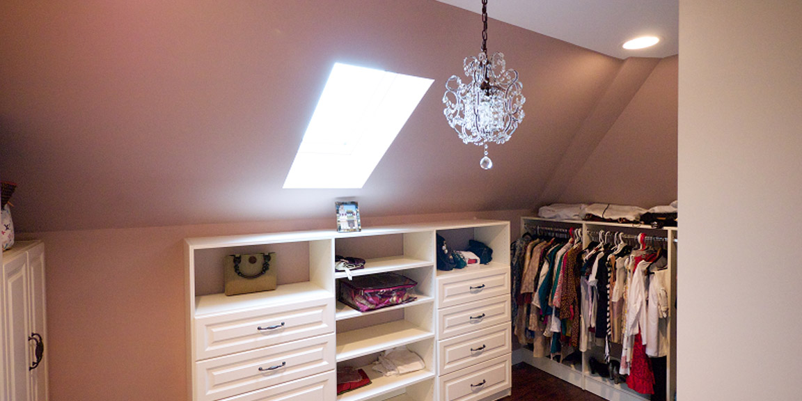 Walk in closet in an amiano and son home addition
