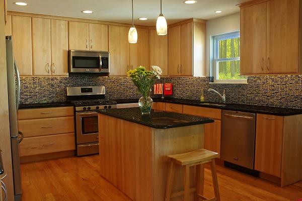 Kitchen remodel with brown cabinets from amiano and son
