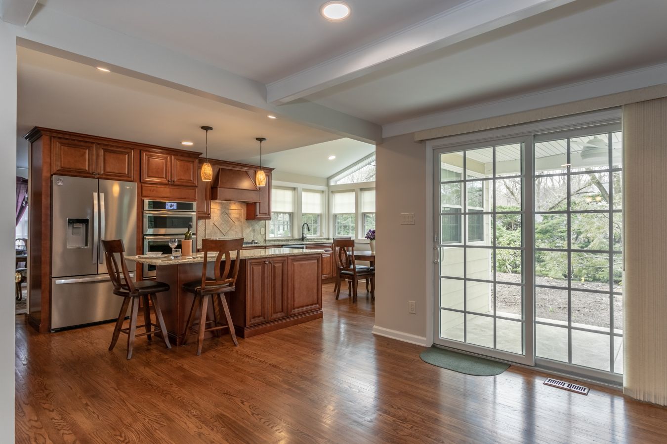 Kitchen with brown cabinets and center island