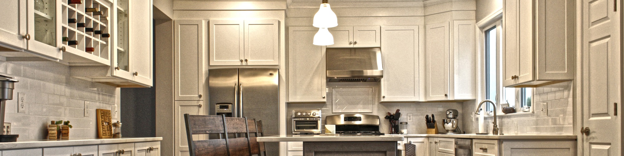 Kitchen with white cabinets from amiano and son