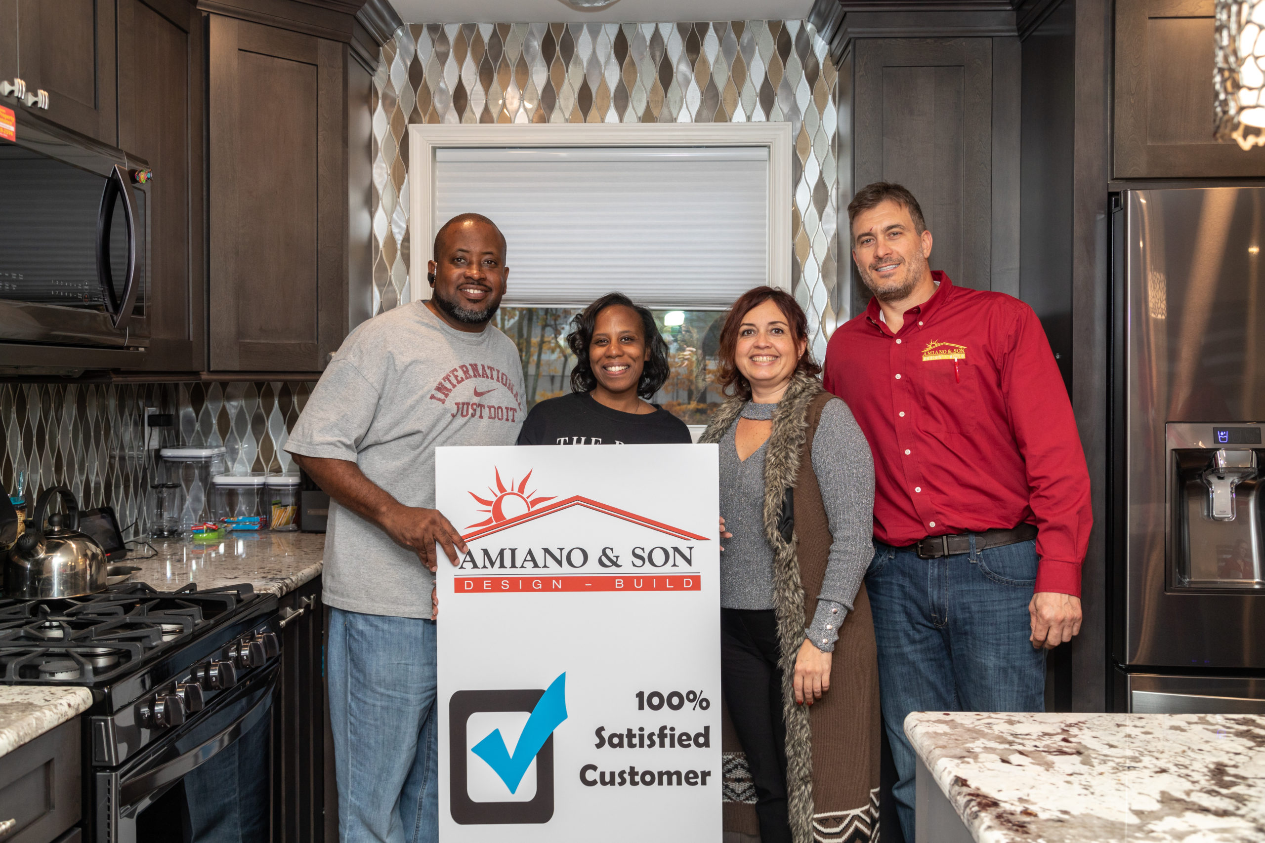 Satisfied amiano and son customers in their remodeled kitchen