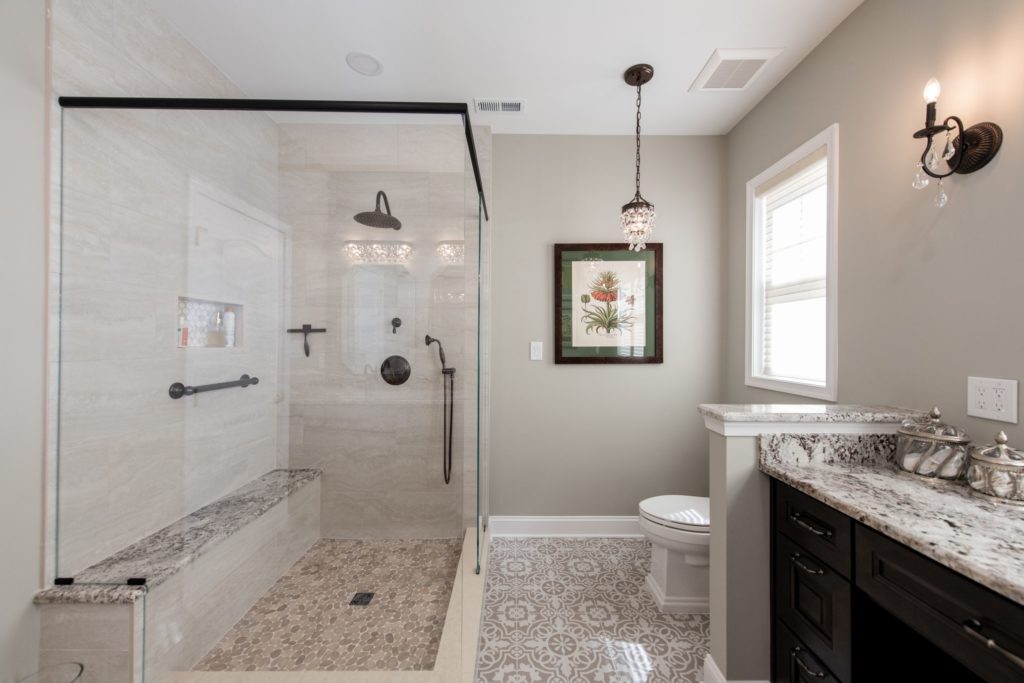 renovated bathroom with glass door shower from amiano and son