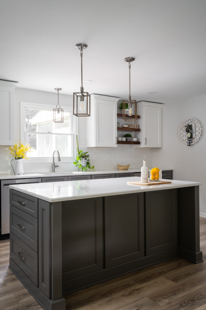 renovated kitchen with gray cabinets and center island from amiano and son construction