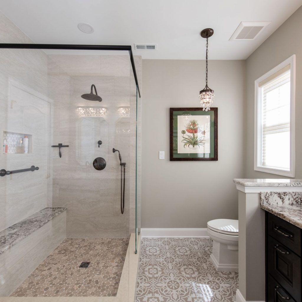renovated bathroom with glass door shower from amiano and son
