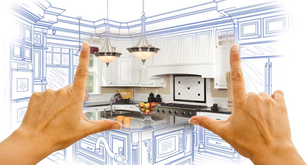 Female Hands Framing Custom Kitchen Design Drawing And Photo Combination.